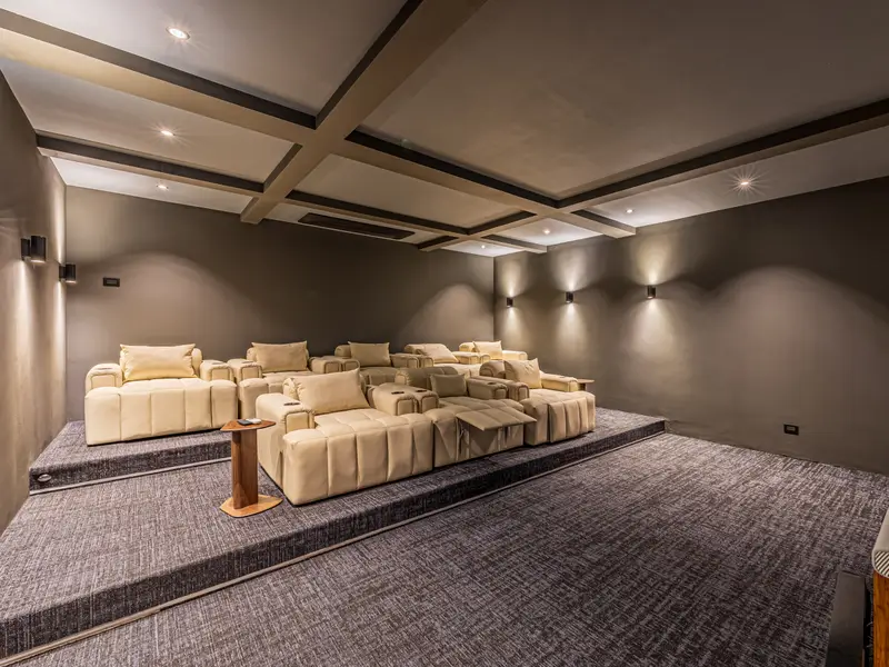 Tiered seating in the private cinema, looking back from the screen