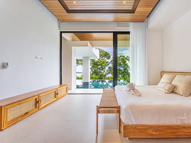 Pool-level bedroom opening onto the terrace